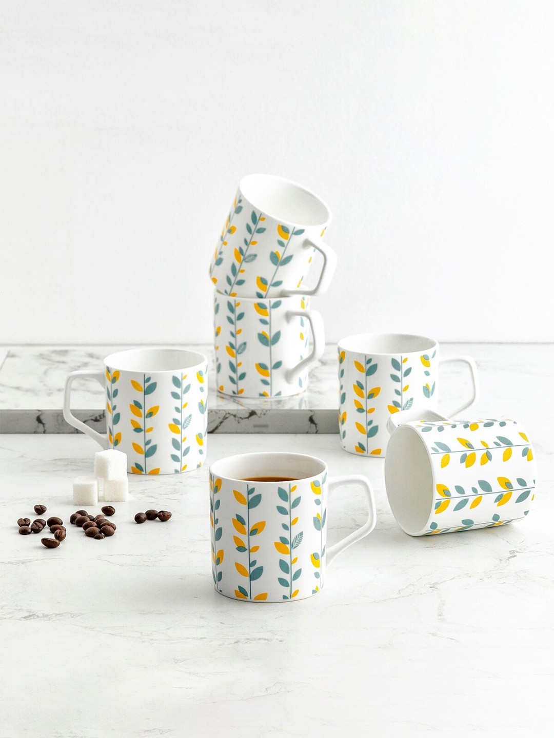 

Home Centre Set Of 6 White & Green Floral Printed Bone China Glossy Cups