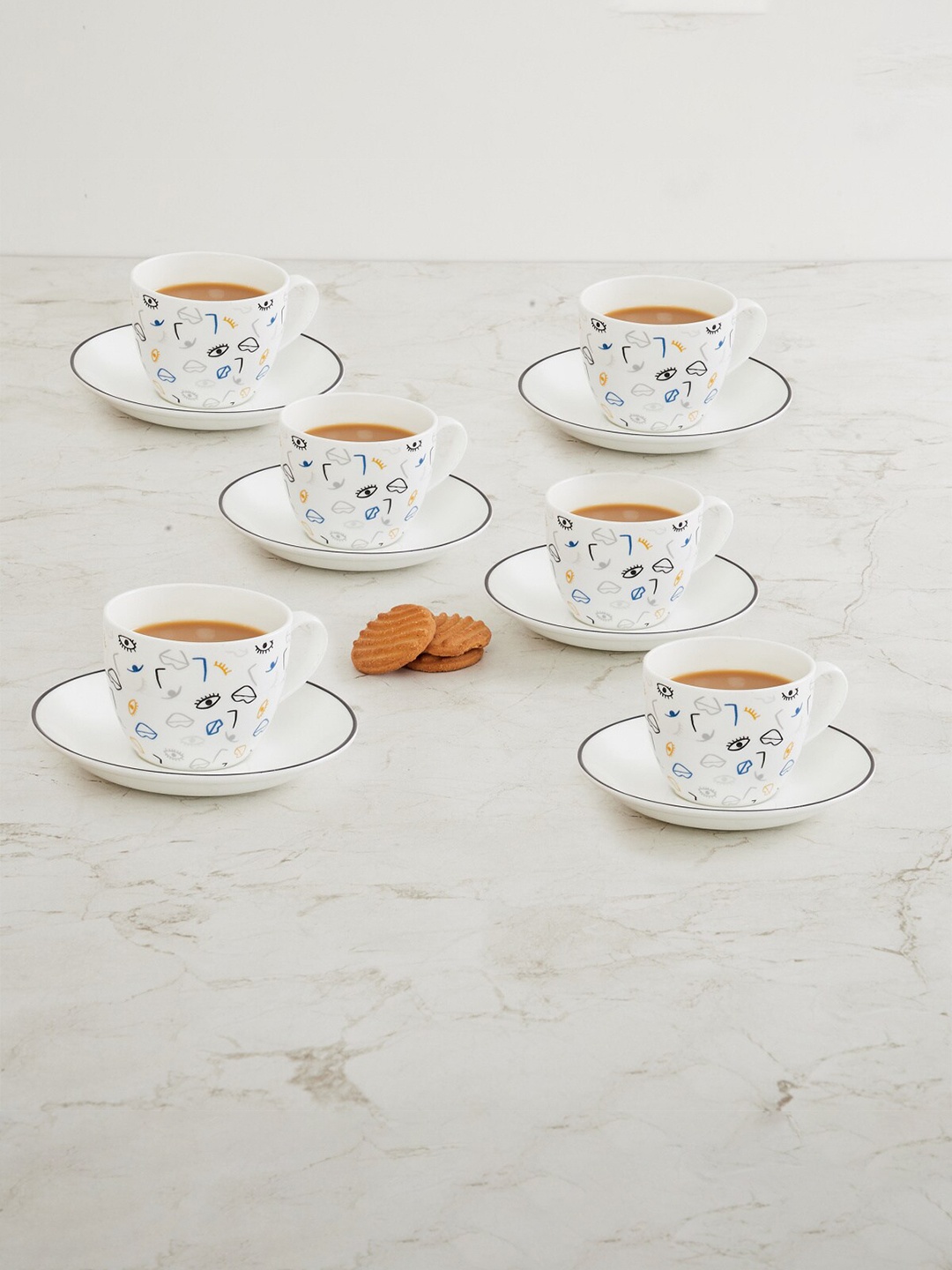 

Home Centre Set Of 6 White & Blue Printed Bone China Glossy Cups and Saucers