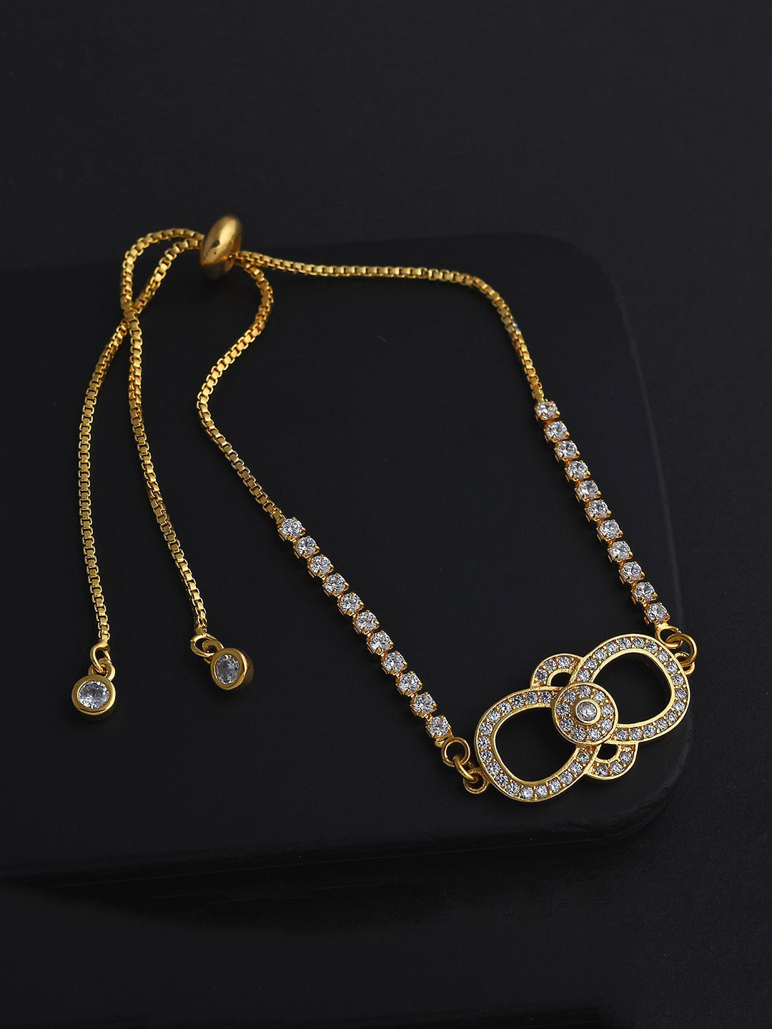 

Tistabene Women Gold-Toned & White AD-Studded Gold-Plated Charm Bracelet