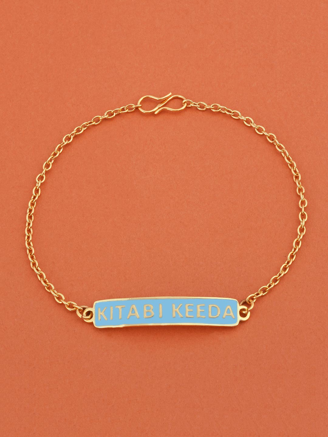 

Tistabene Women Gold-Toned & Turquoise Blue FITNESS FREAK Engraved Charm Bracelet