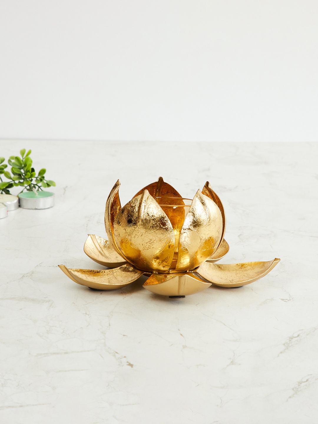 

Home Centre Gold-Toned Corsica Lotus T-Light Candle Holder