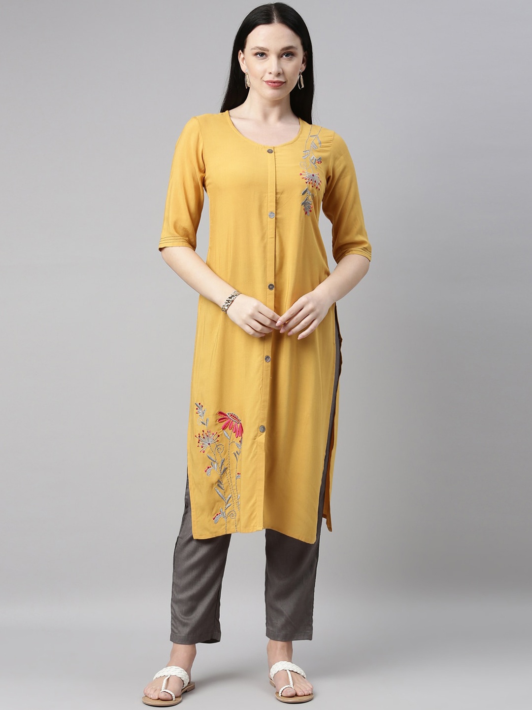 

Neerus Women Mustard Yellow Floral Embroidered Regular Kurta with Trousers