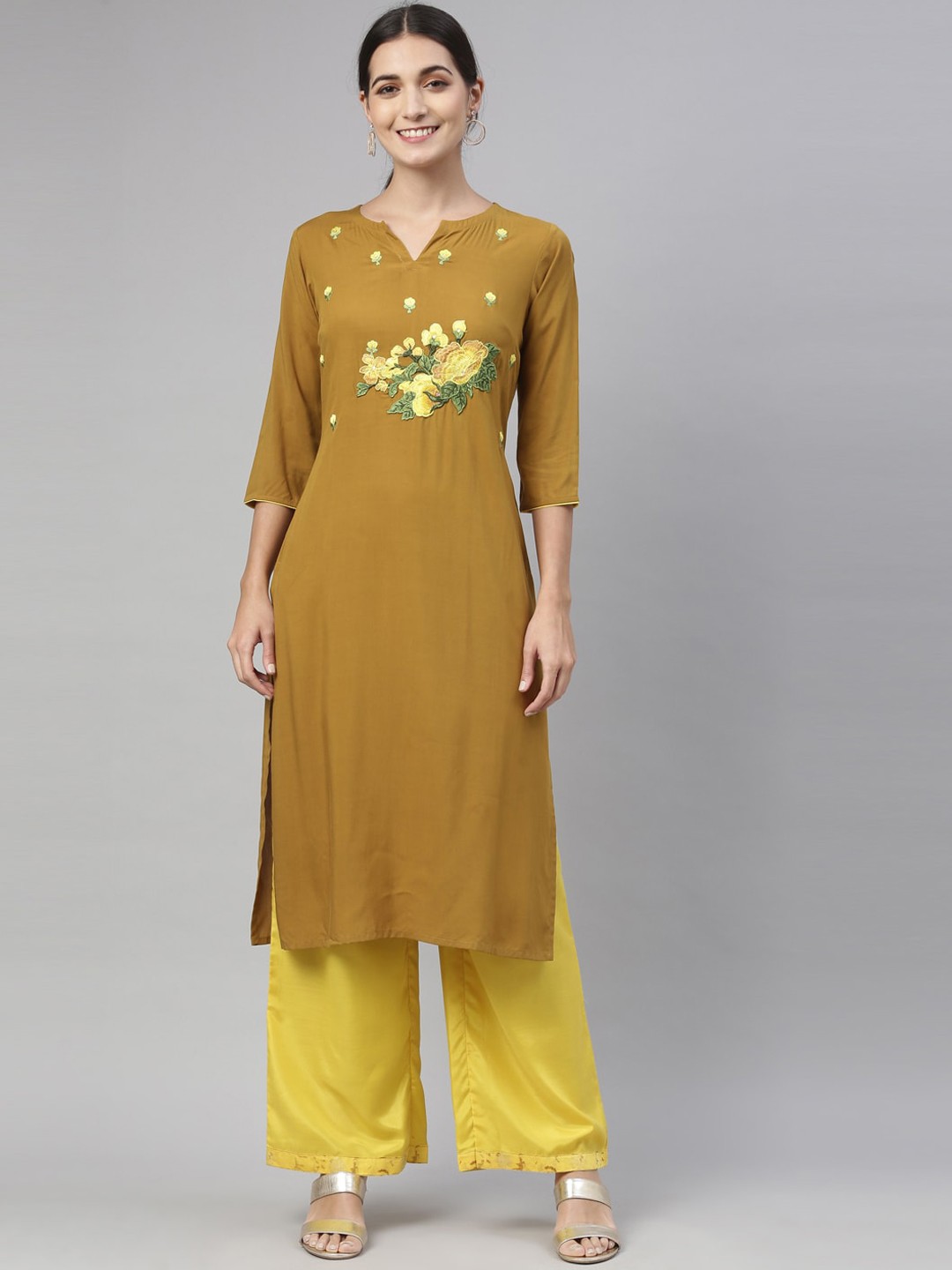 

Neerus Women Khaki & Yellow Floral Yoke Embroidered Regular Kurta with Palazzos