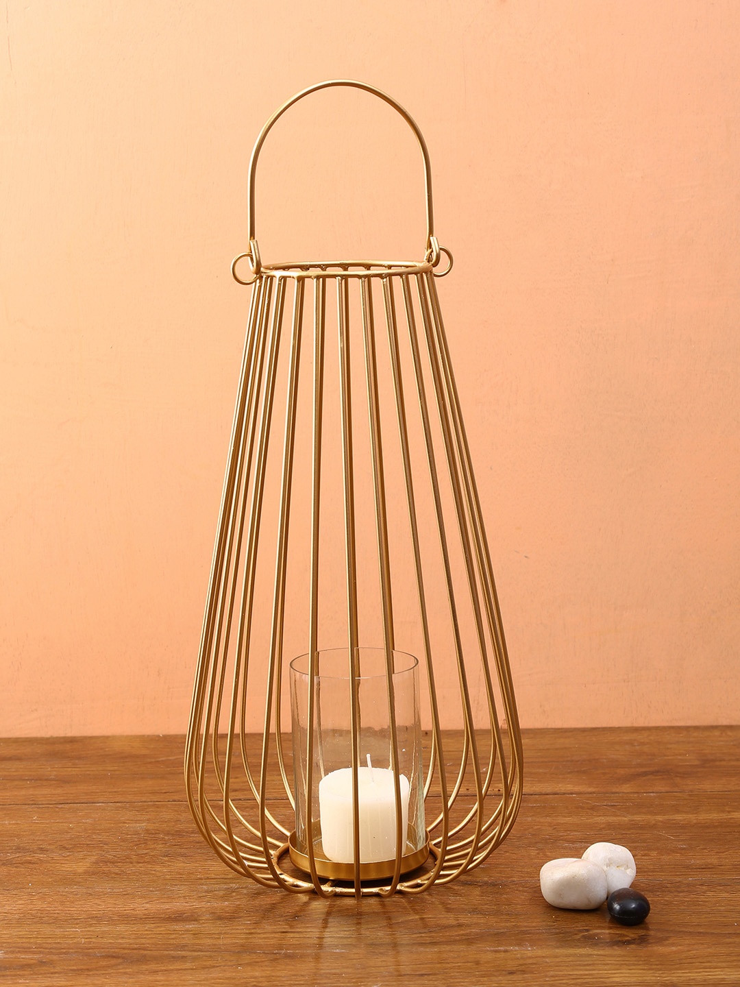 

Aapno Rajasthan Gold-Toned & Transparent Solid Lantern Shape Tealight Holder