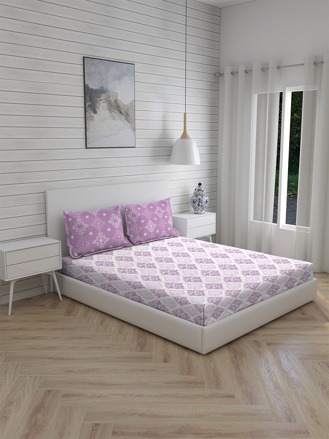 

Layers Purple & White Ethnic Motifs 144 TC King Bedsheet with 2 Pillow Covers