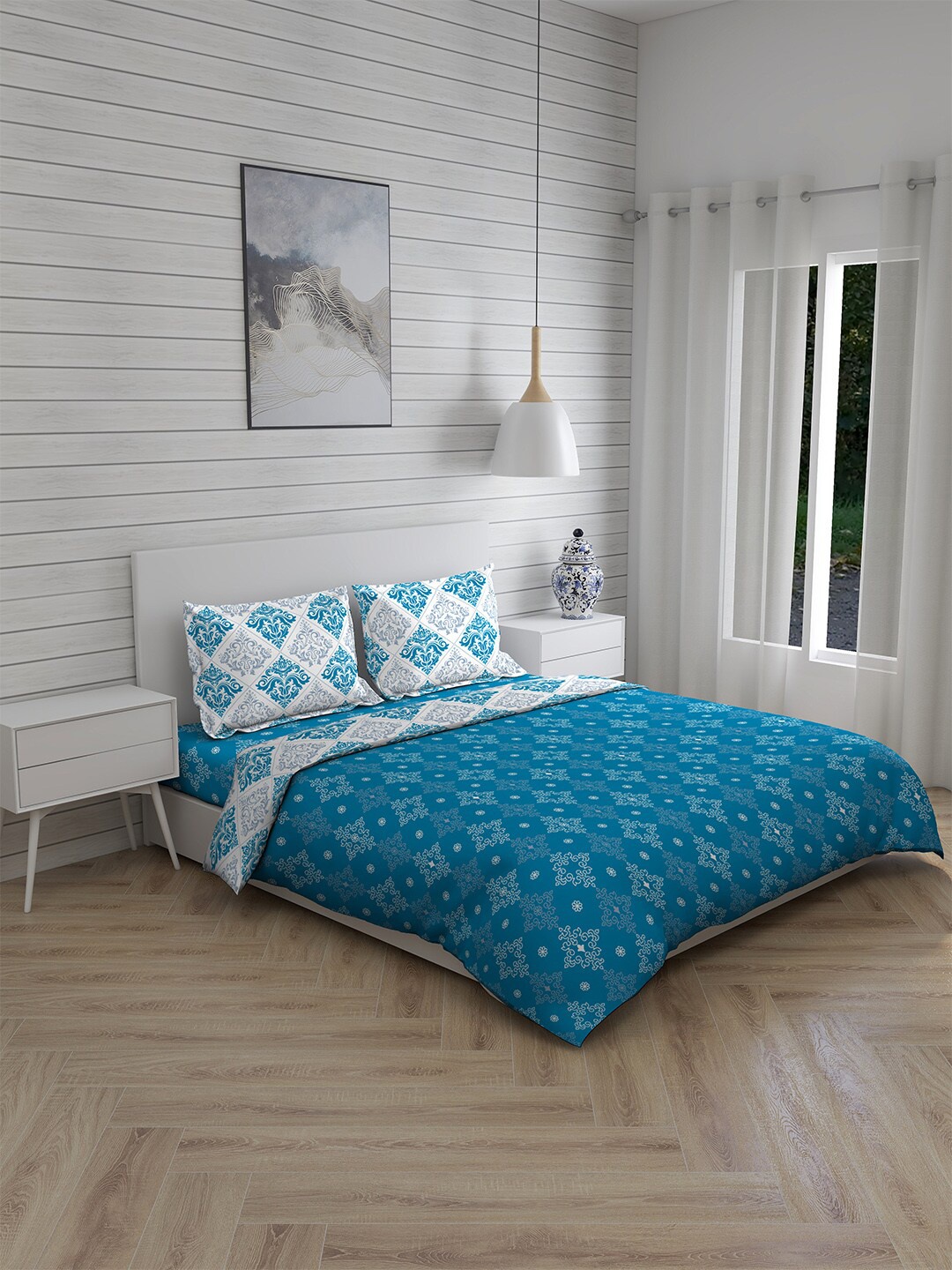 

Layers Blue & White Printed 146 TC Pure Cotton Bedding Set