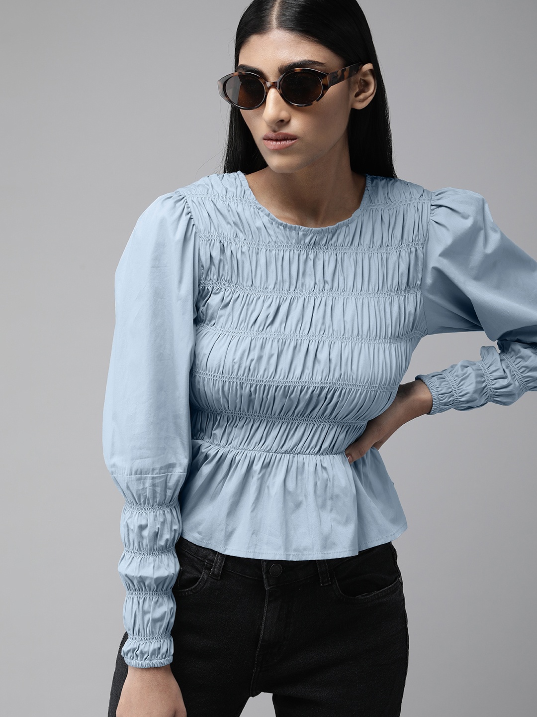 

The Roadster Lifestyle Co Blue Solid Smocking Puff Sleeves Peplum Top