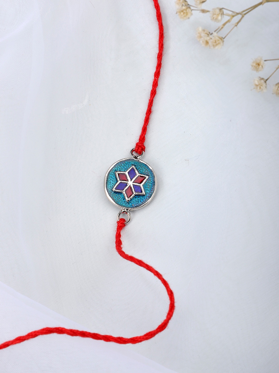 

Fabindia Red & Blue Thread Rakhi