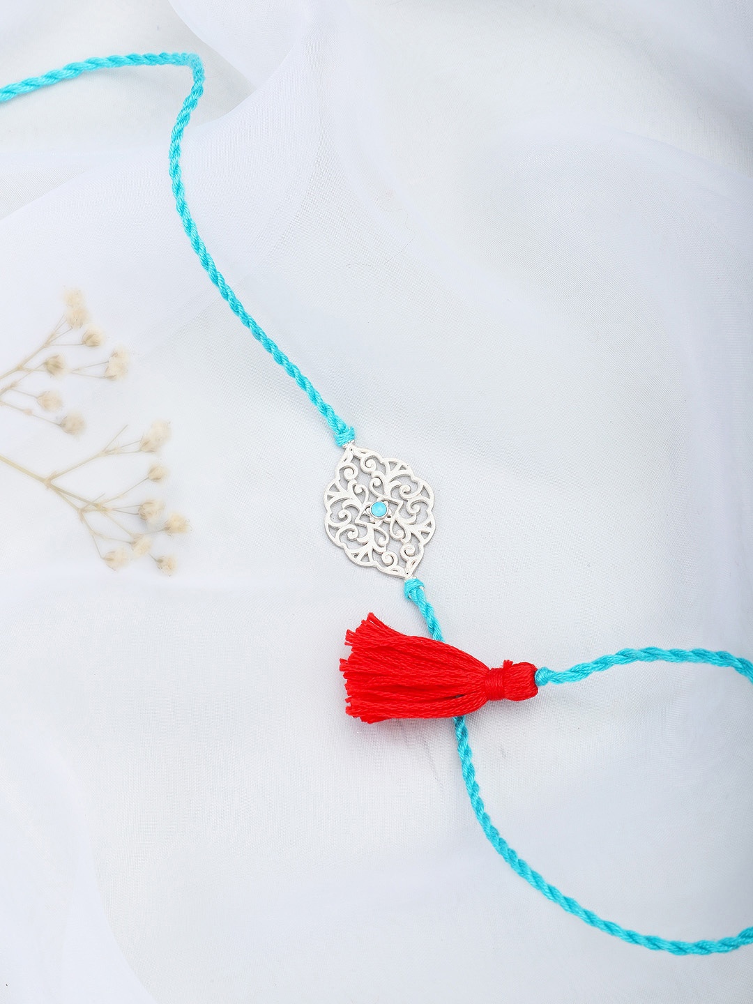 

Fabindia Blue & SIlver-Toned Thread Rakhi