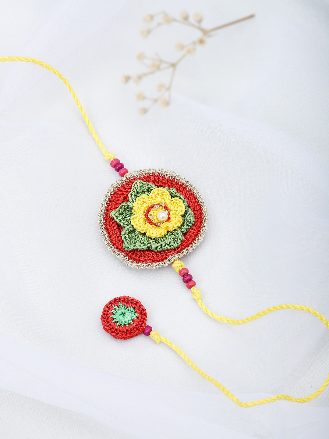 

Fabindia Yellow & Red Thread Rakhi