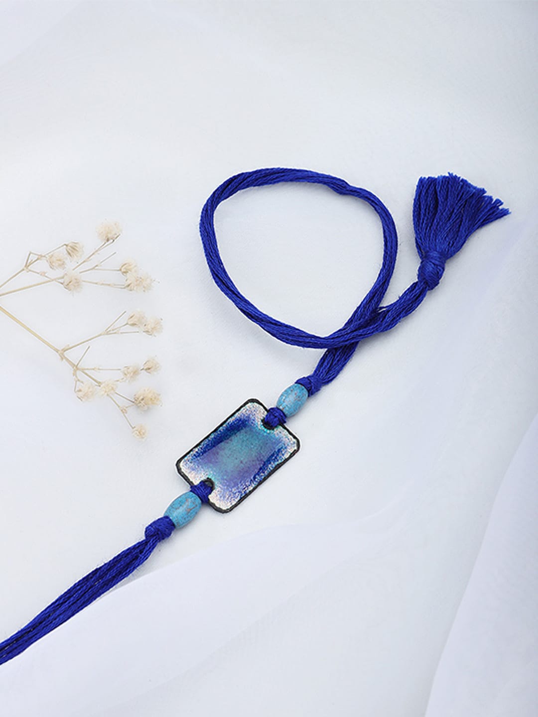 

Fabindia Navy Blue Wraparound Rakhi