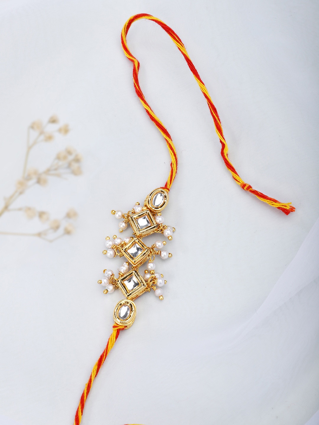 

Fabindia Red & Yellow Thread Rakhi
