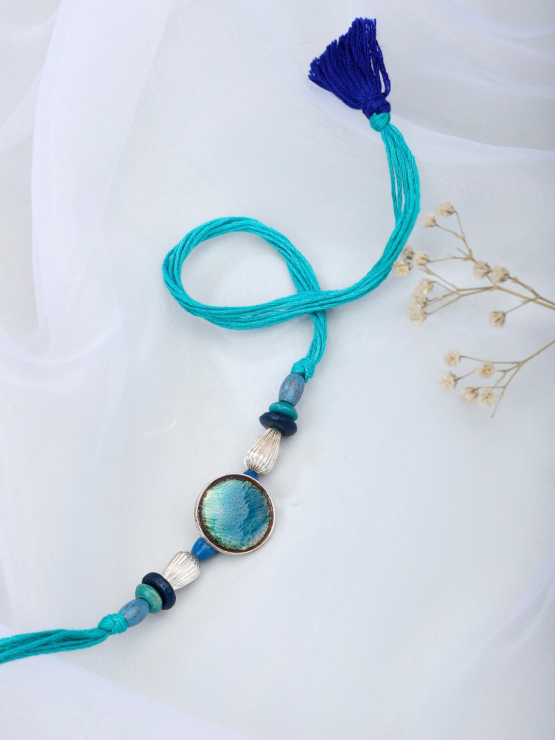 

Fabindia Blue Thread Rakhi