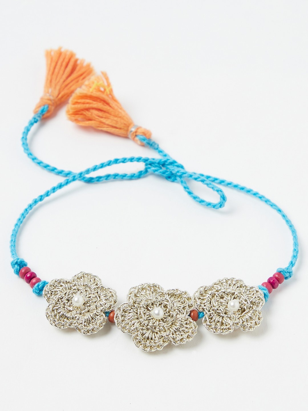 

Fabindia Blue & Beige Thread Rakhi