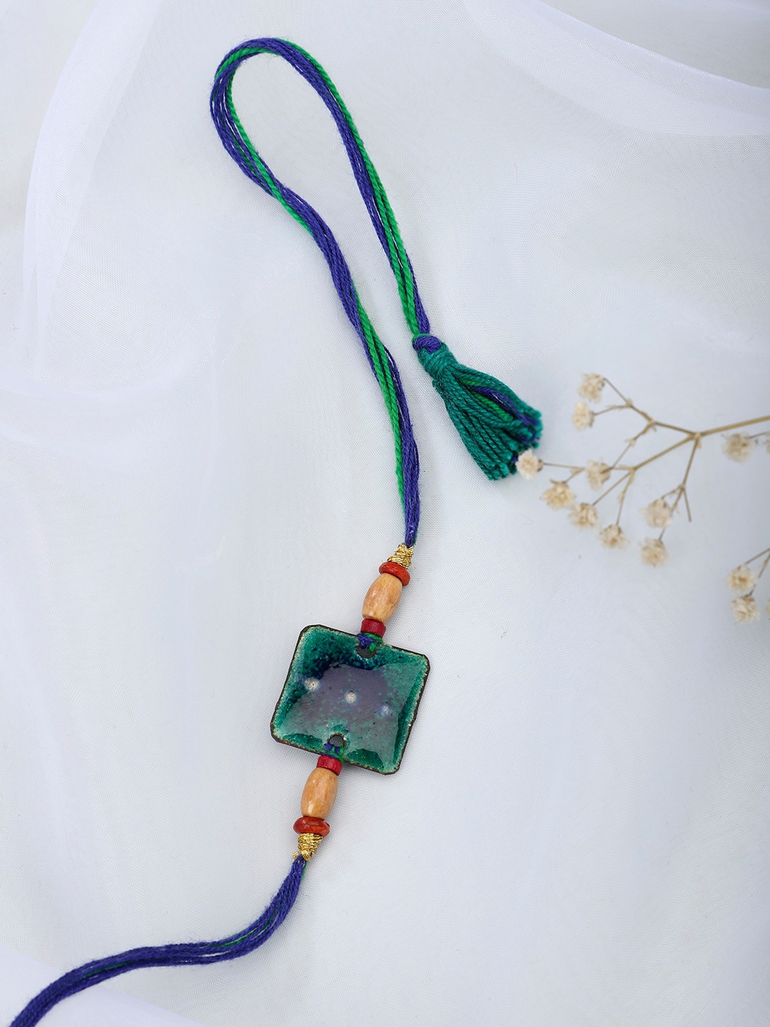 

Fabindia Green Thread Rakhi