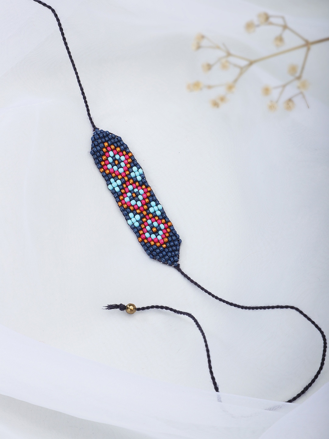 

Fabindia Blue & Pink Thread Rakhi