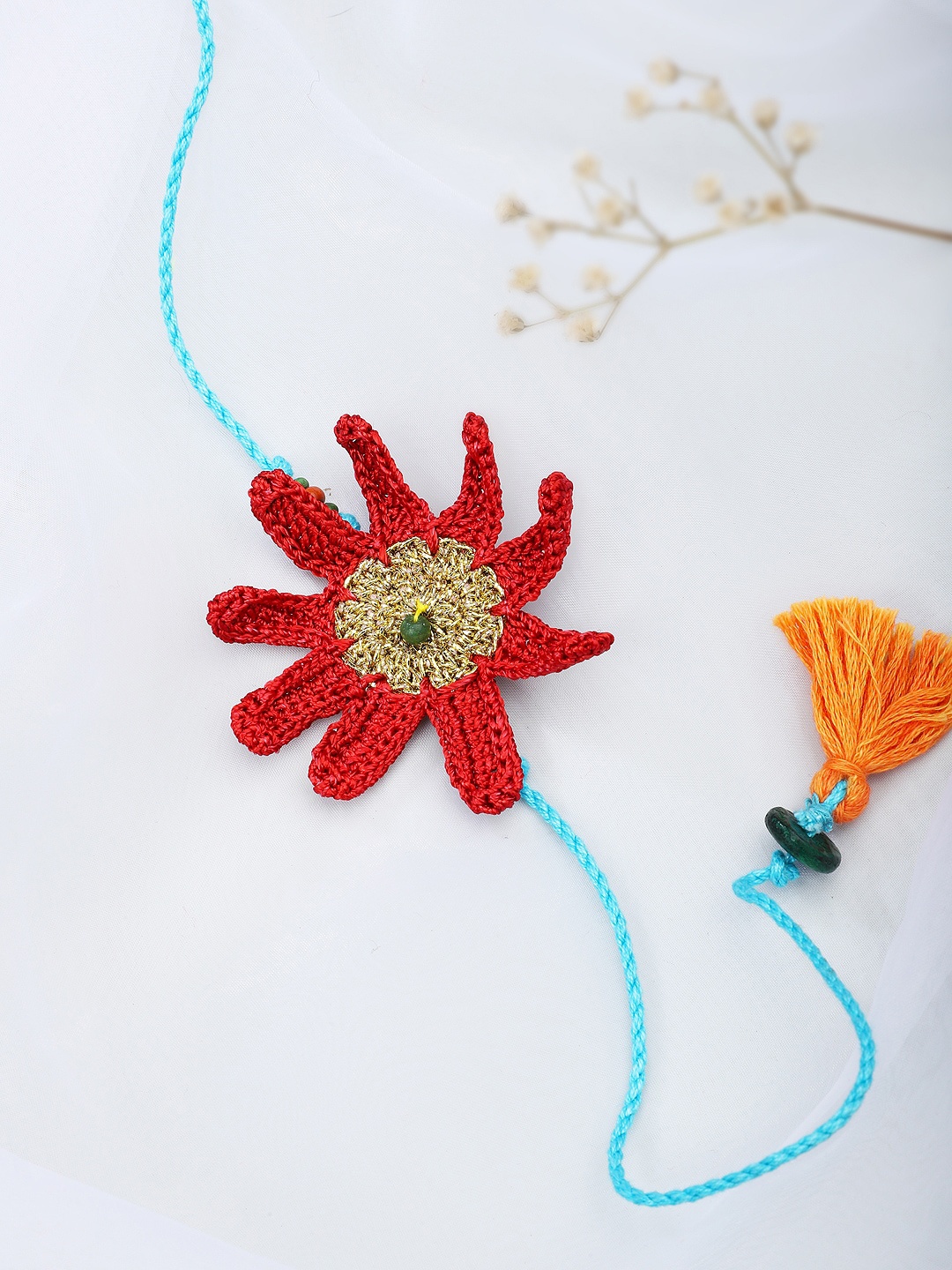 

Fabindia Blue & Red Thread Rakhi