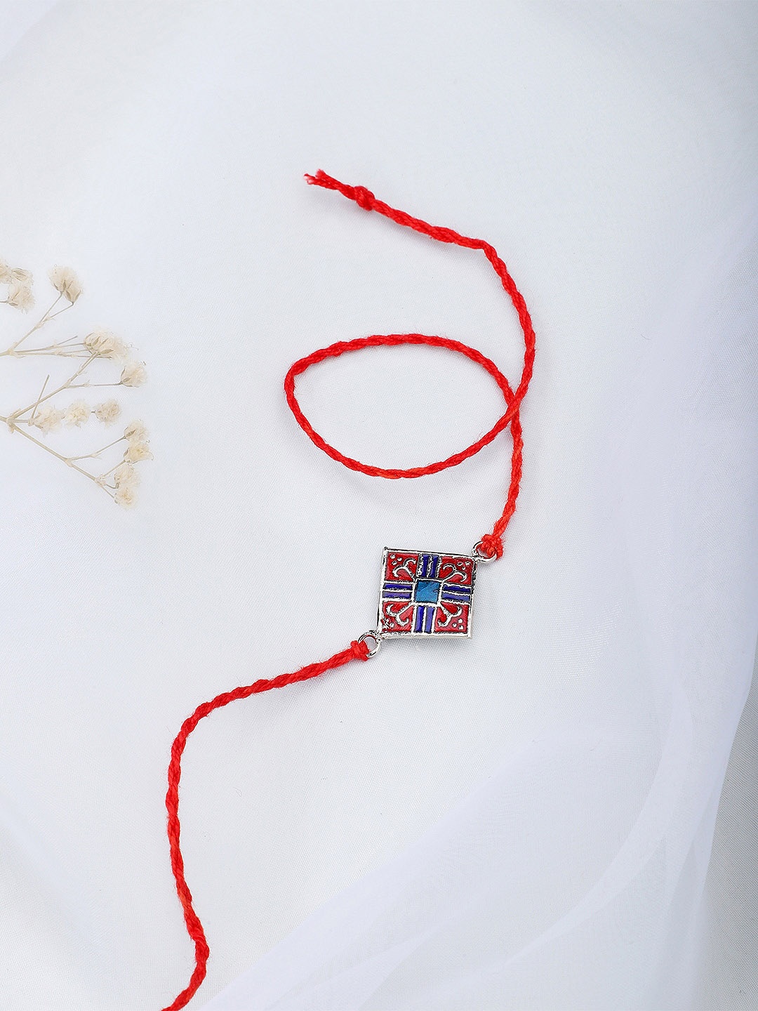 

Fabindia Red & Blue Wraparound Rakhi