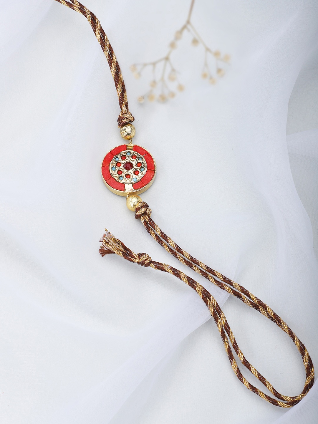

Fabindia Brown & Gold-Toned Thread Rakhi