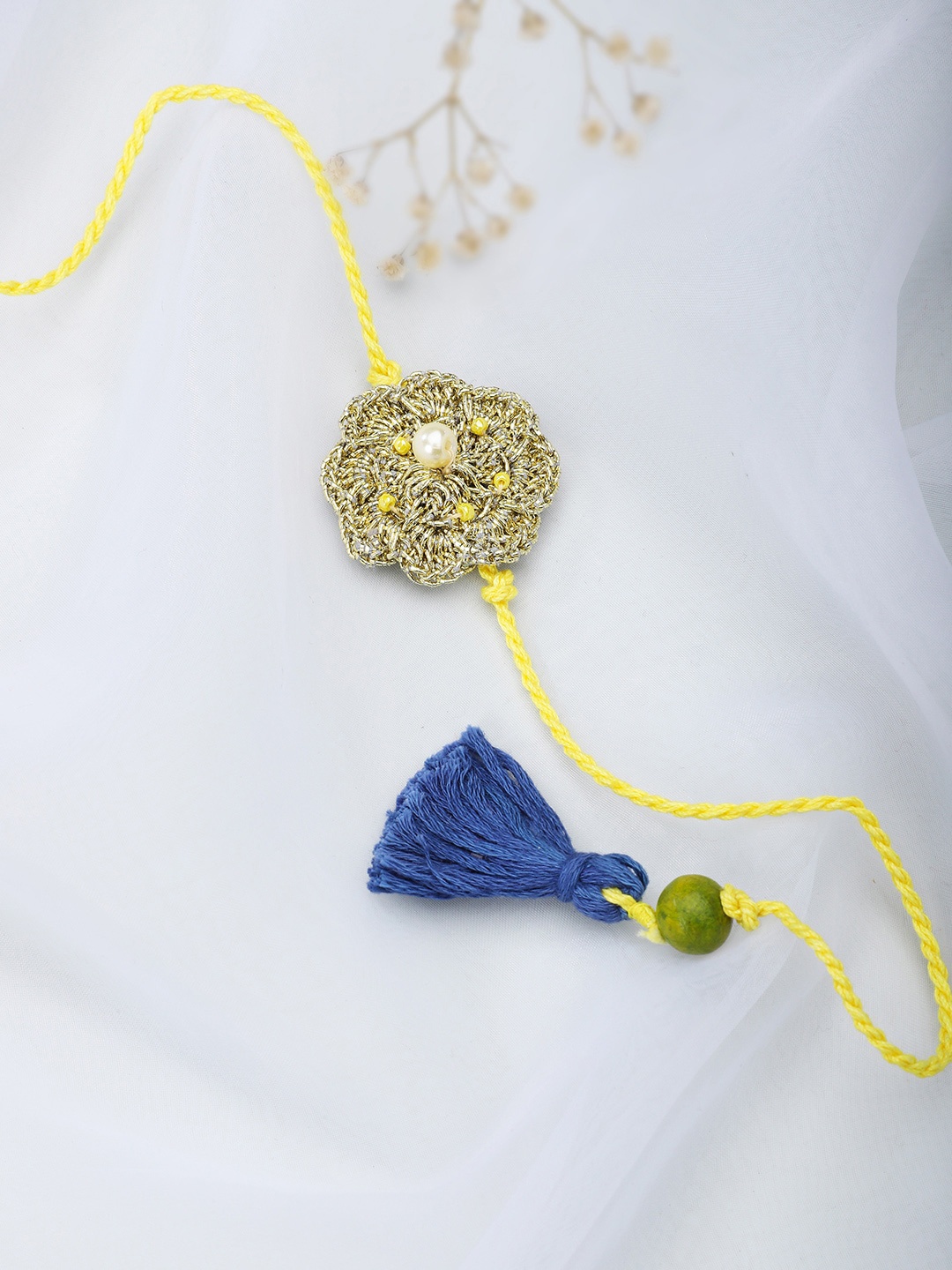 

Fabindia Yellow Thread Rakhi