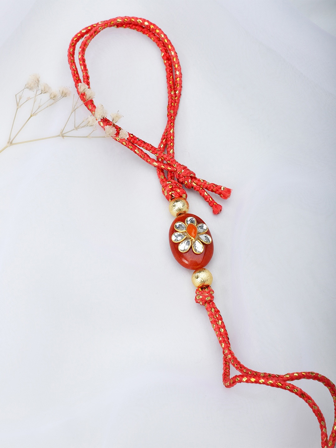 

Fabindia Pink & Orange Thread Rakhi