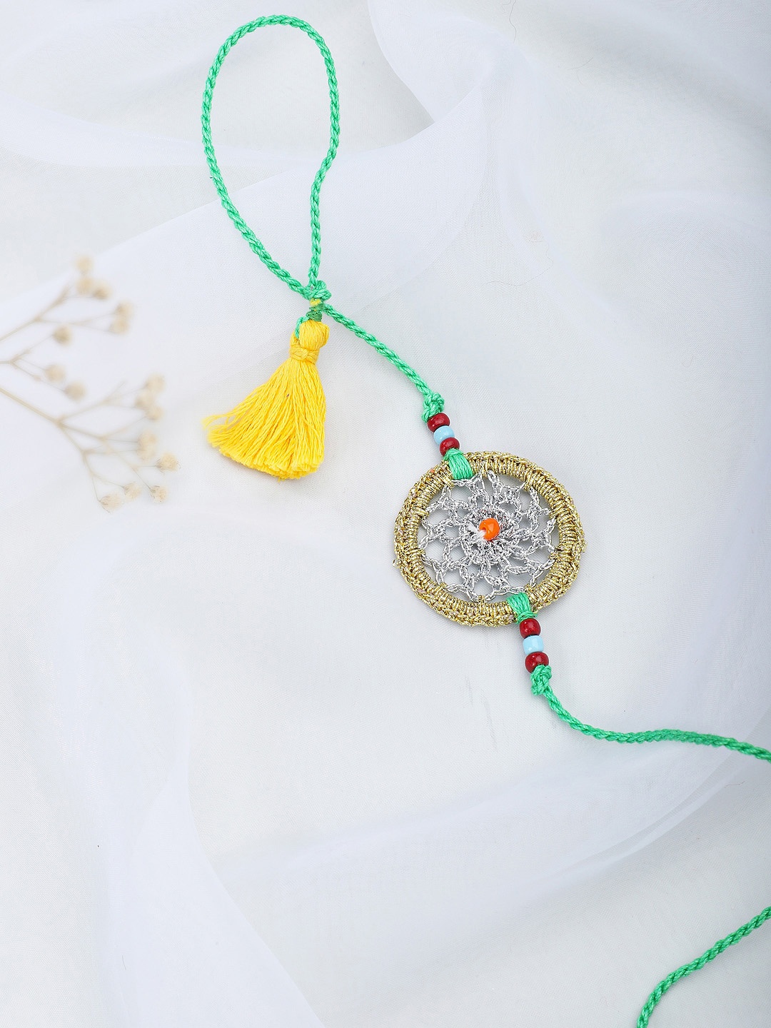 

Fabindia Women Green & Yellow Woven Design Thread Rakhi