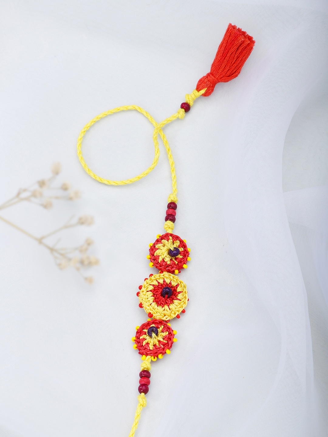 

Fabindia Yellow & Red Rakhi