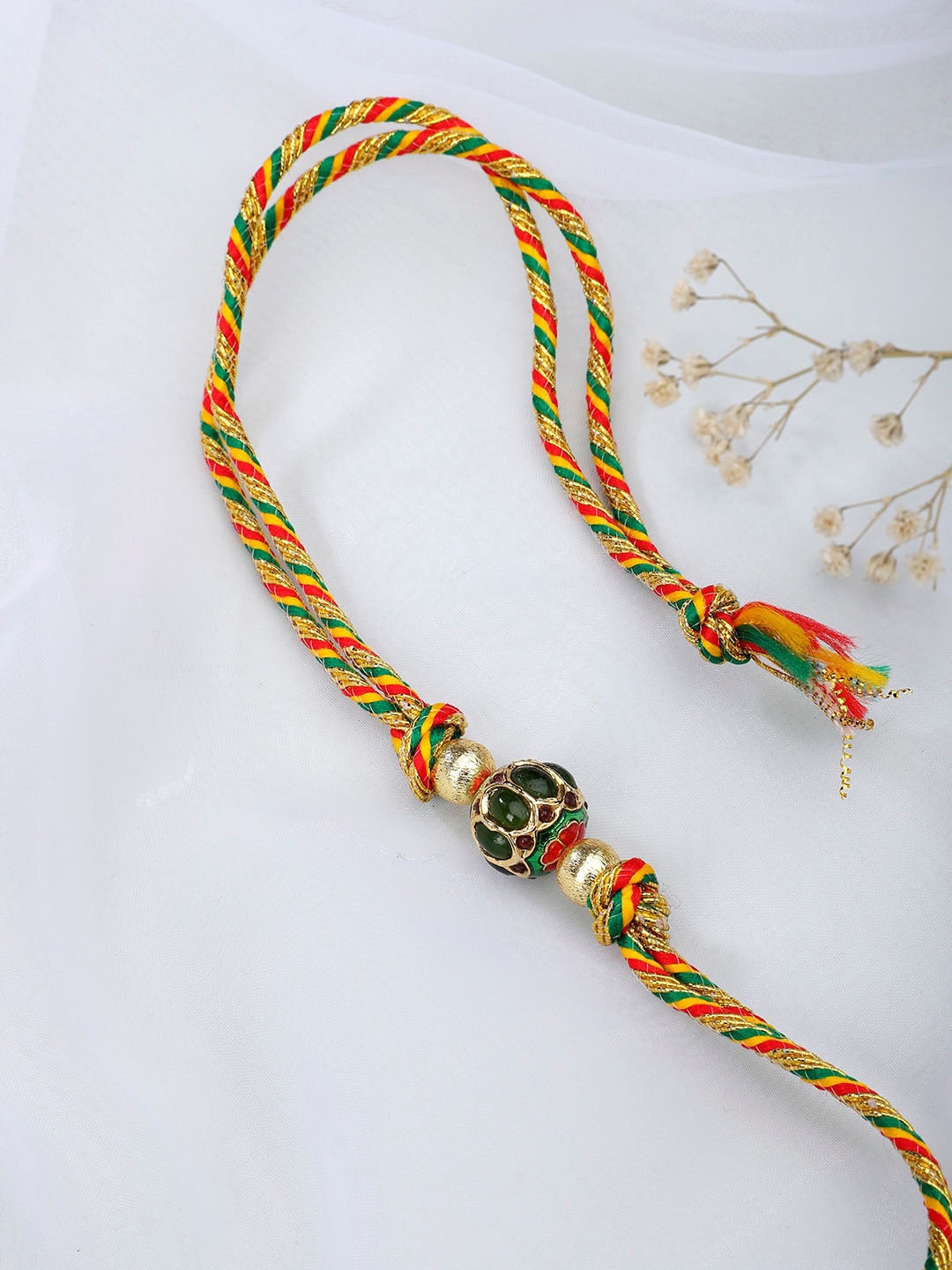 

Fabindia Women Red & Green Thread Rakhi