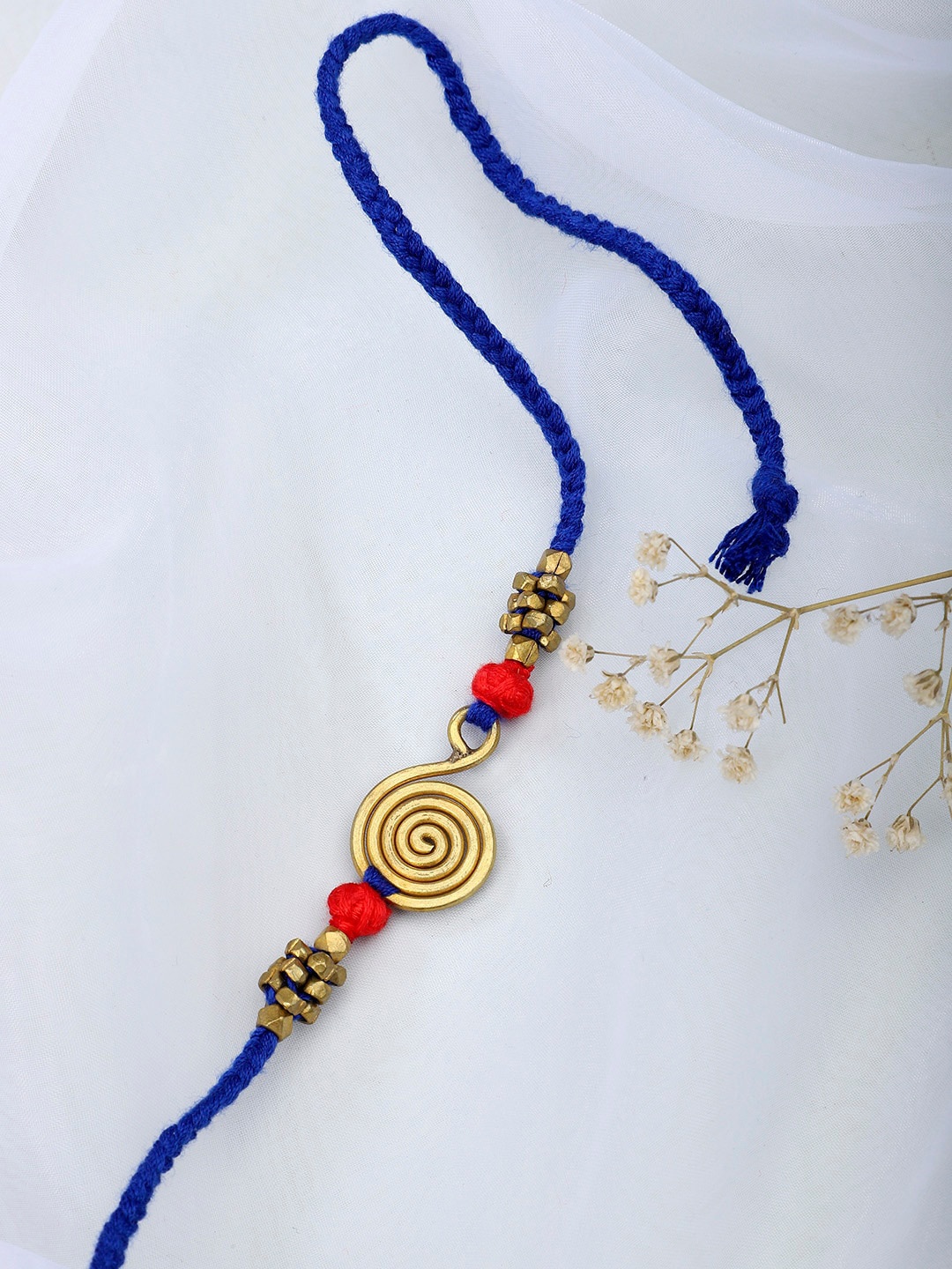 

Fabindia Women Blue & Gold Rakhi