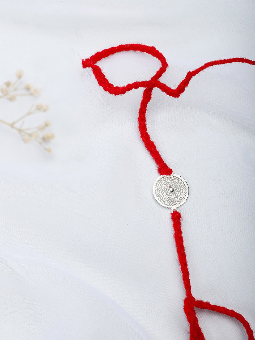 

Fabindia Red & Silver-Toned Thread Rakhi