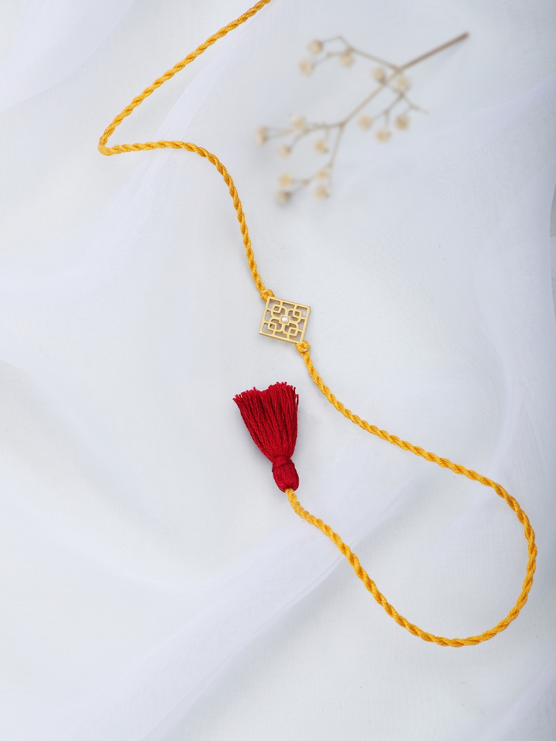 

Fabindia Yellow Silver Rakhi