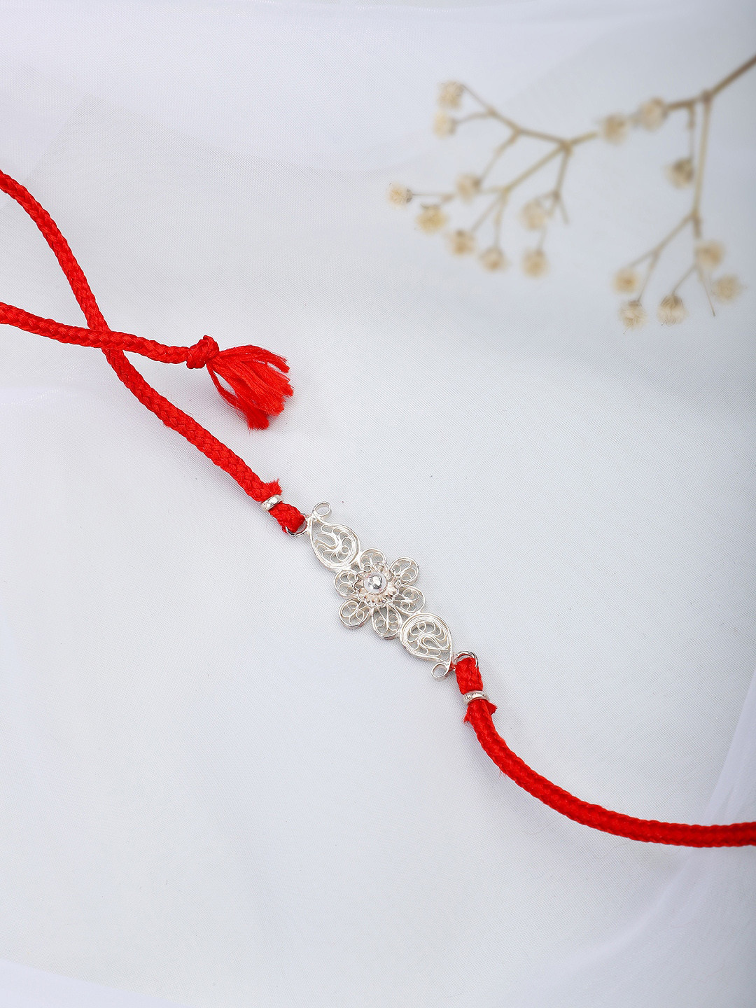 

Fabindia Women Red & White Thread Rakhi
