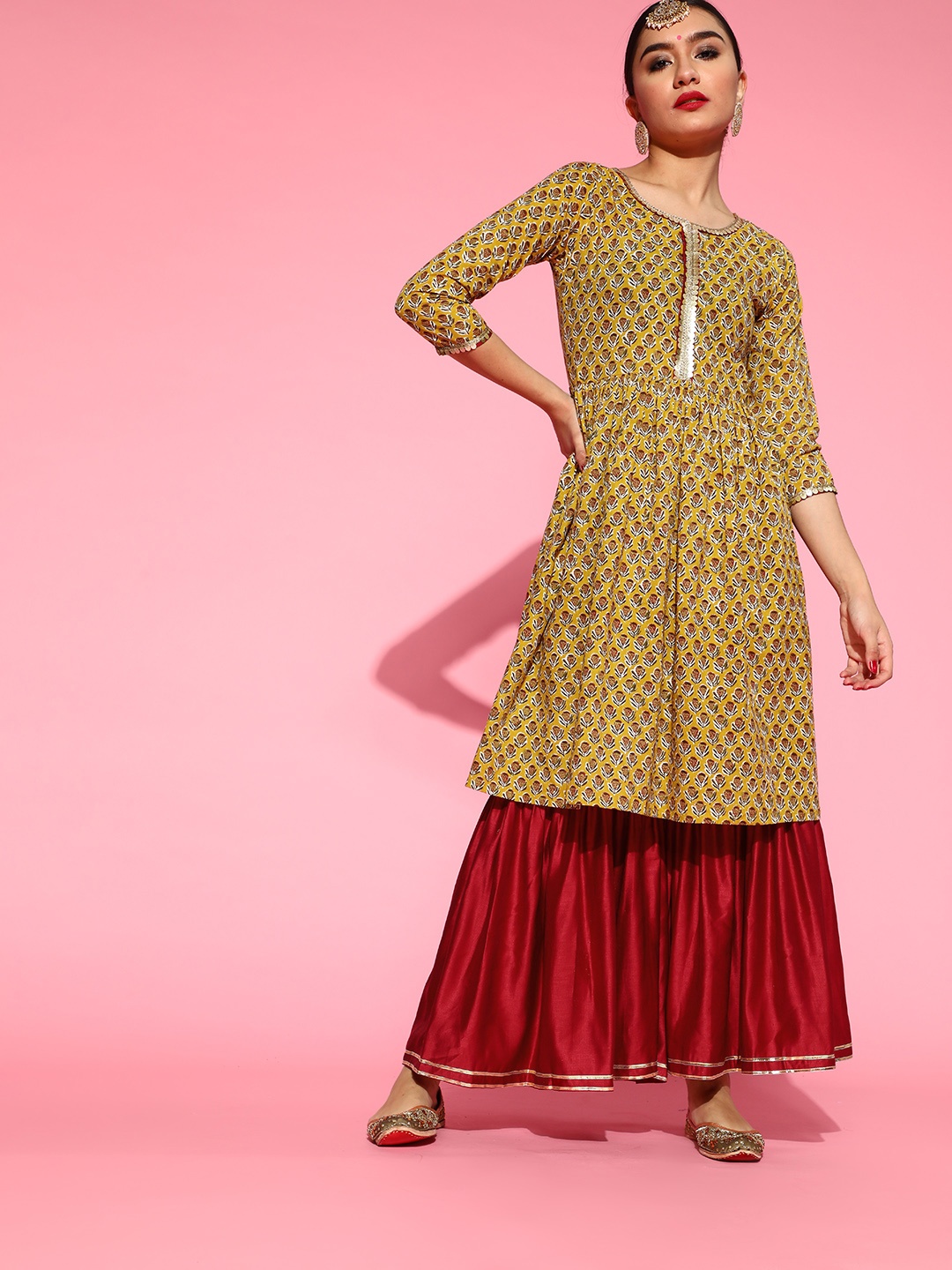 

Indo Era Ethnic Motifs Cotton Blend Kurta Set, Mustard