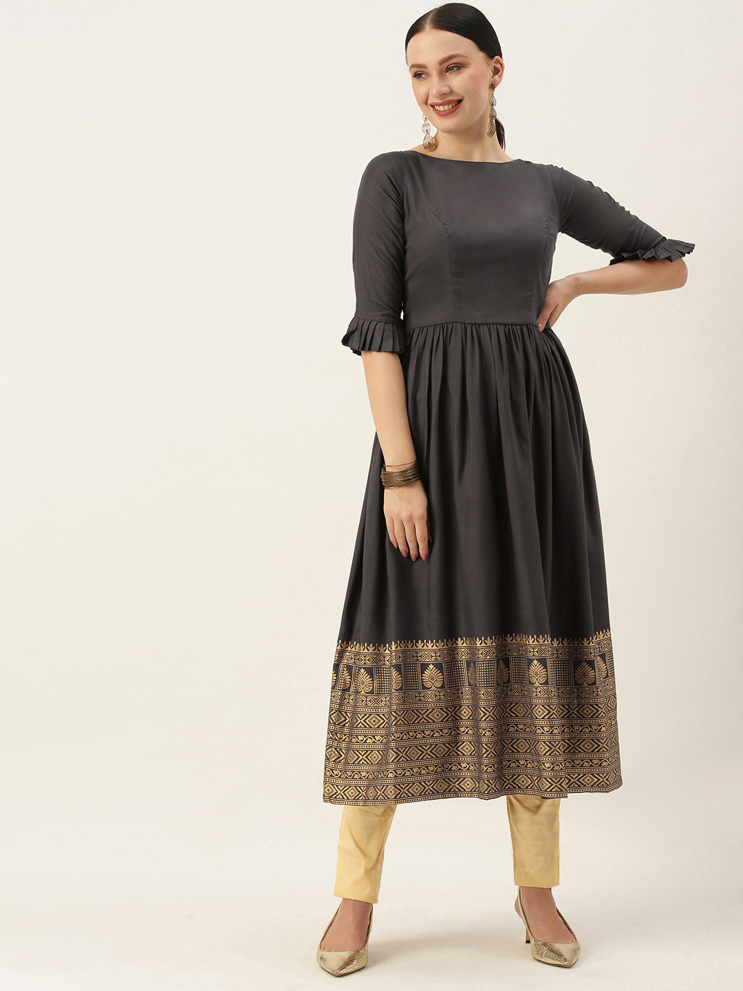 

Ethnovog Women Black Gold-Toned Ethnic Motifs Empire Kurta with Trousers