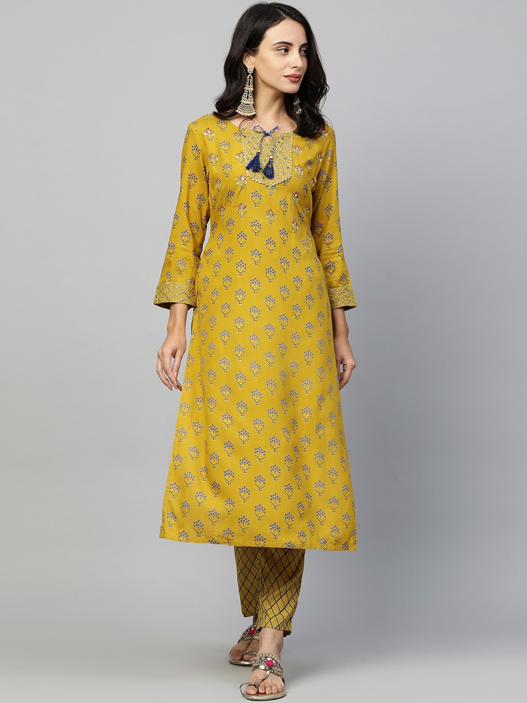 

FASHOR Women Mustard Yellow Floral Printed Regular Kurta with Trousers