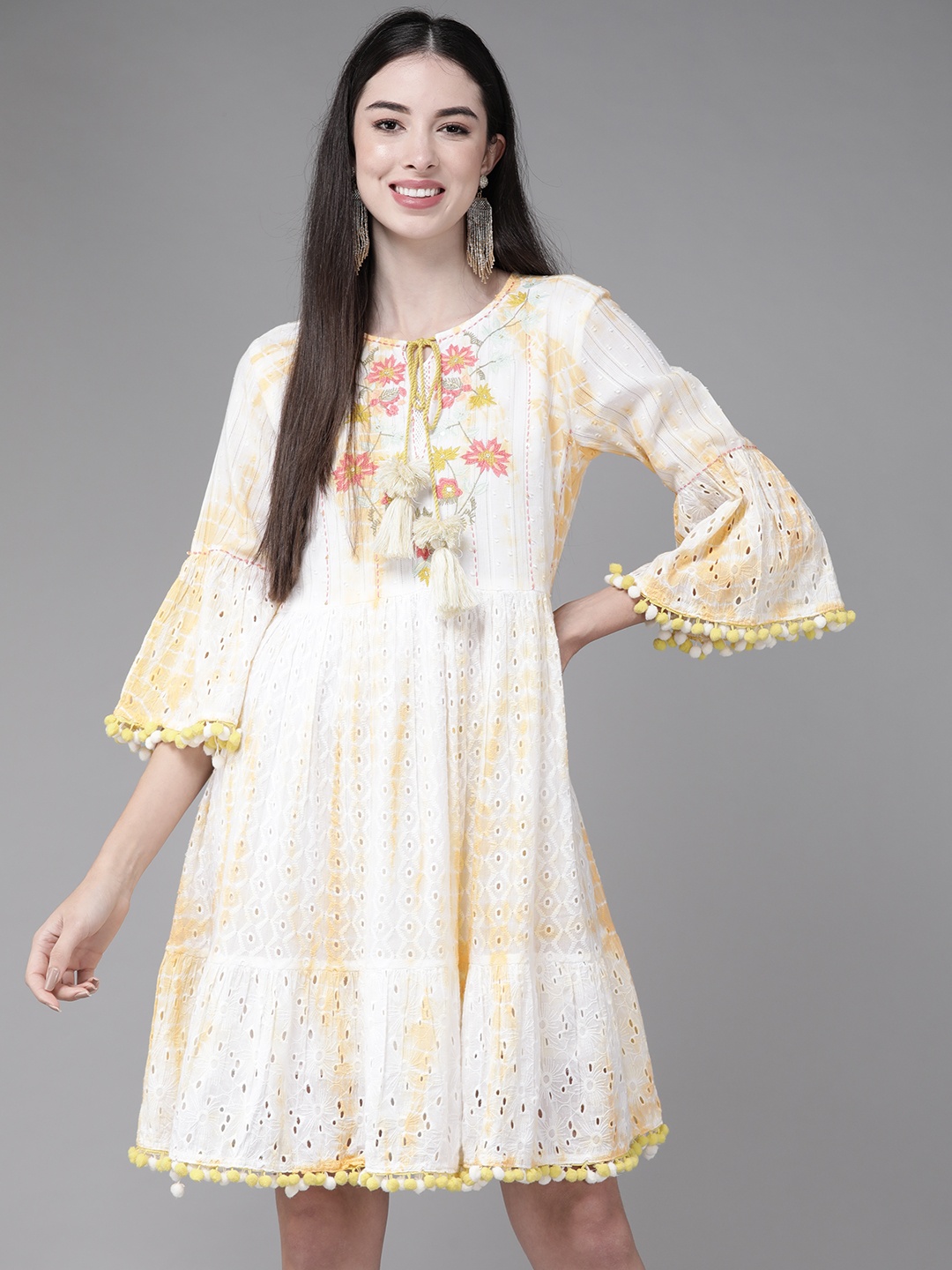 

Indo Era Yellow & White Floral Embroidered Tie-Up Neck Tie-Dye A-Line Dress