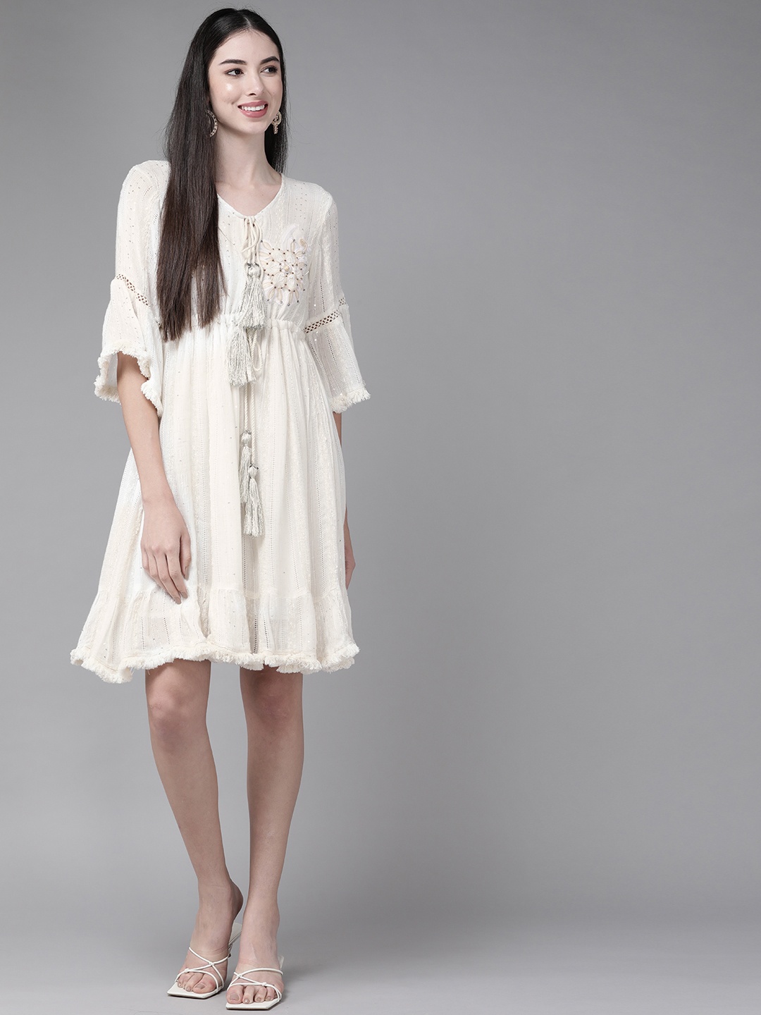 

Indo Era White Floral Embroidered Tie-Up Neck Flared Dress