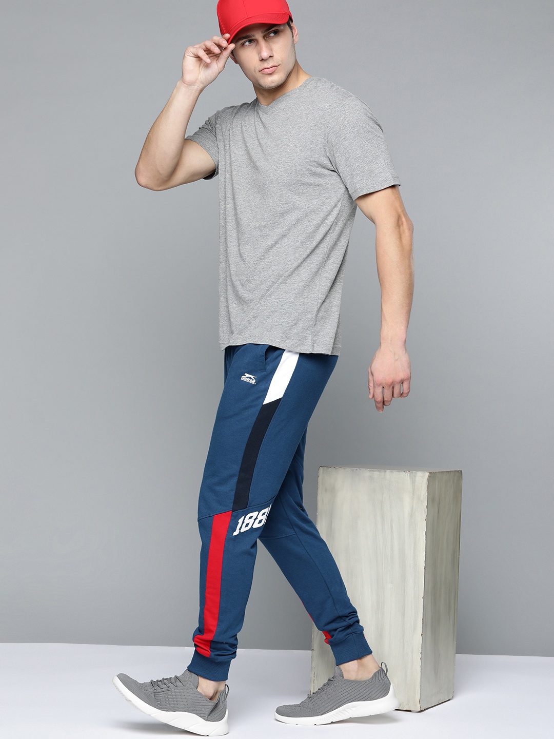 

Slazenger Men Teal Blue Solid Bio-Wash Athleisure Joggers with Contrast Side Panelling