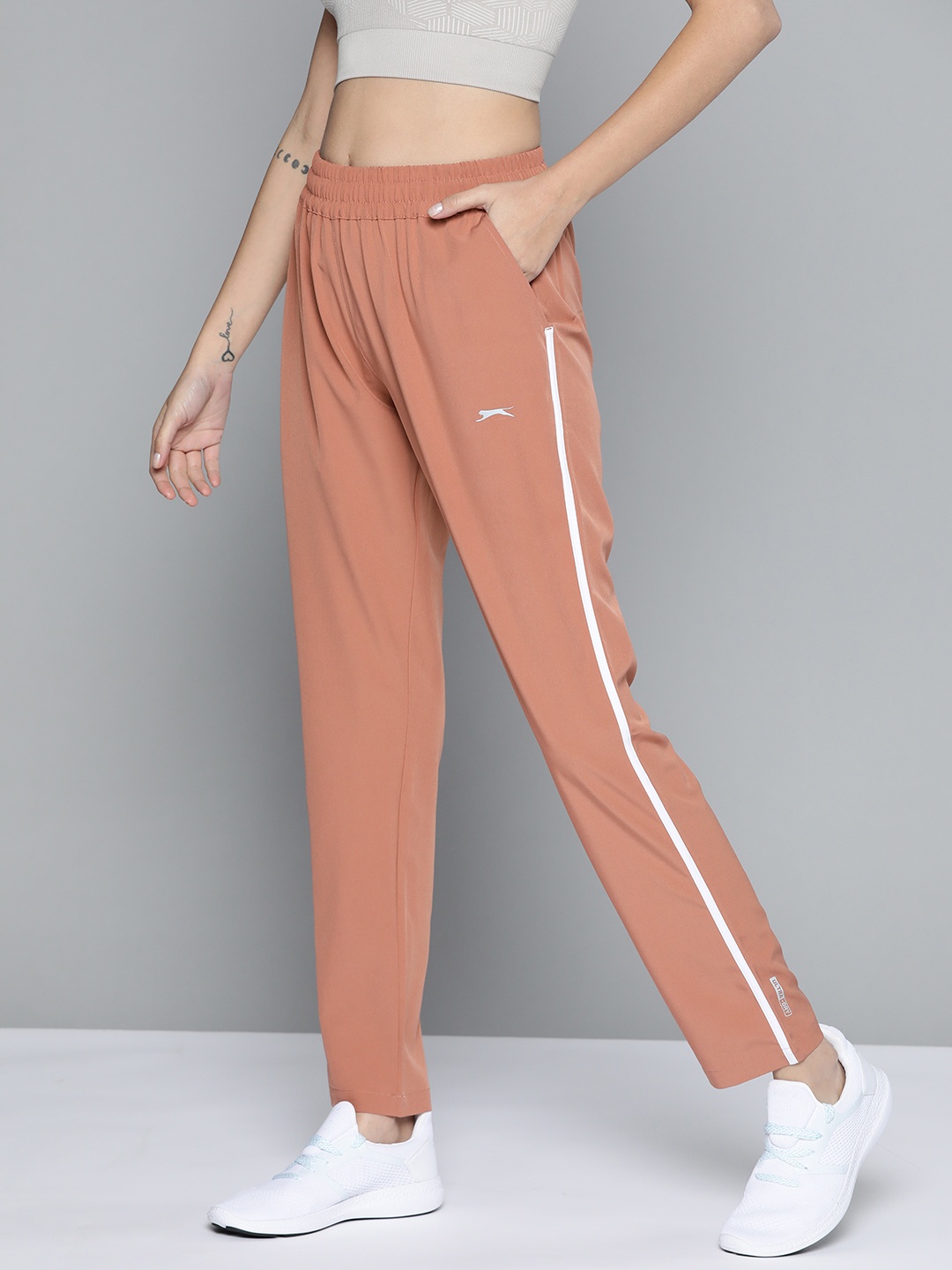 

Slazenger Women Dusty Pink Solid Running Track Pants with Side Stripe Detail
