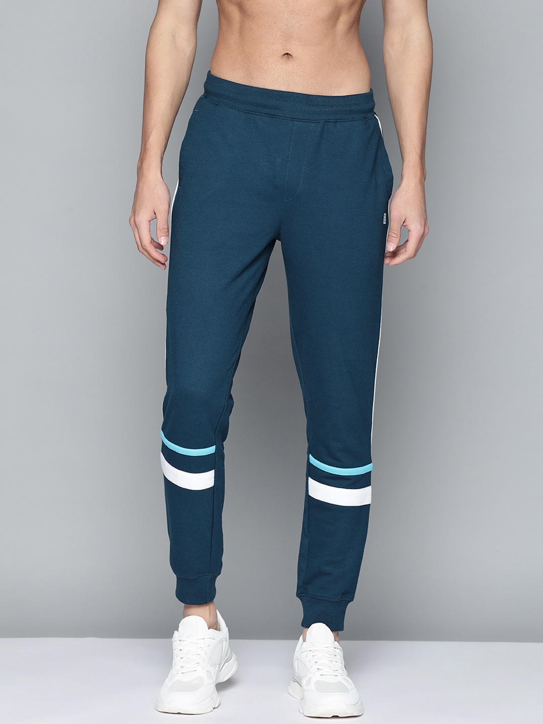 

Slazenger Men Teal Blue Solid Joggers with Stripe Detail