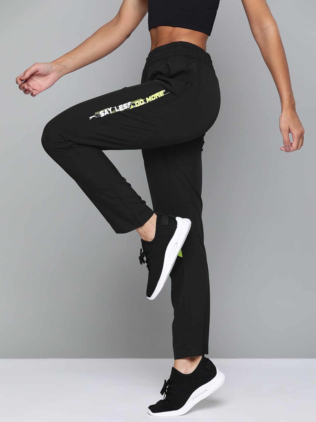 

Slazenger Women Black Solid Track Pants With Stripe Detail