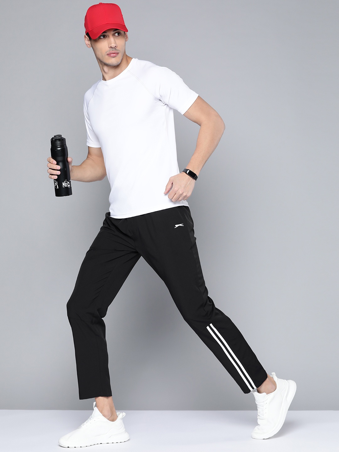 

Slazenger Men Black Solid Track Pants With Stripe Detail