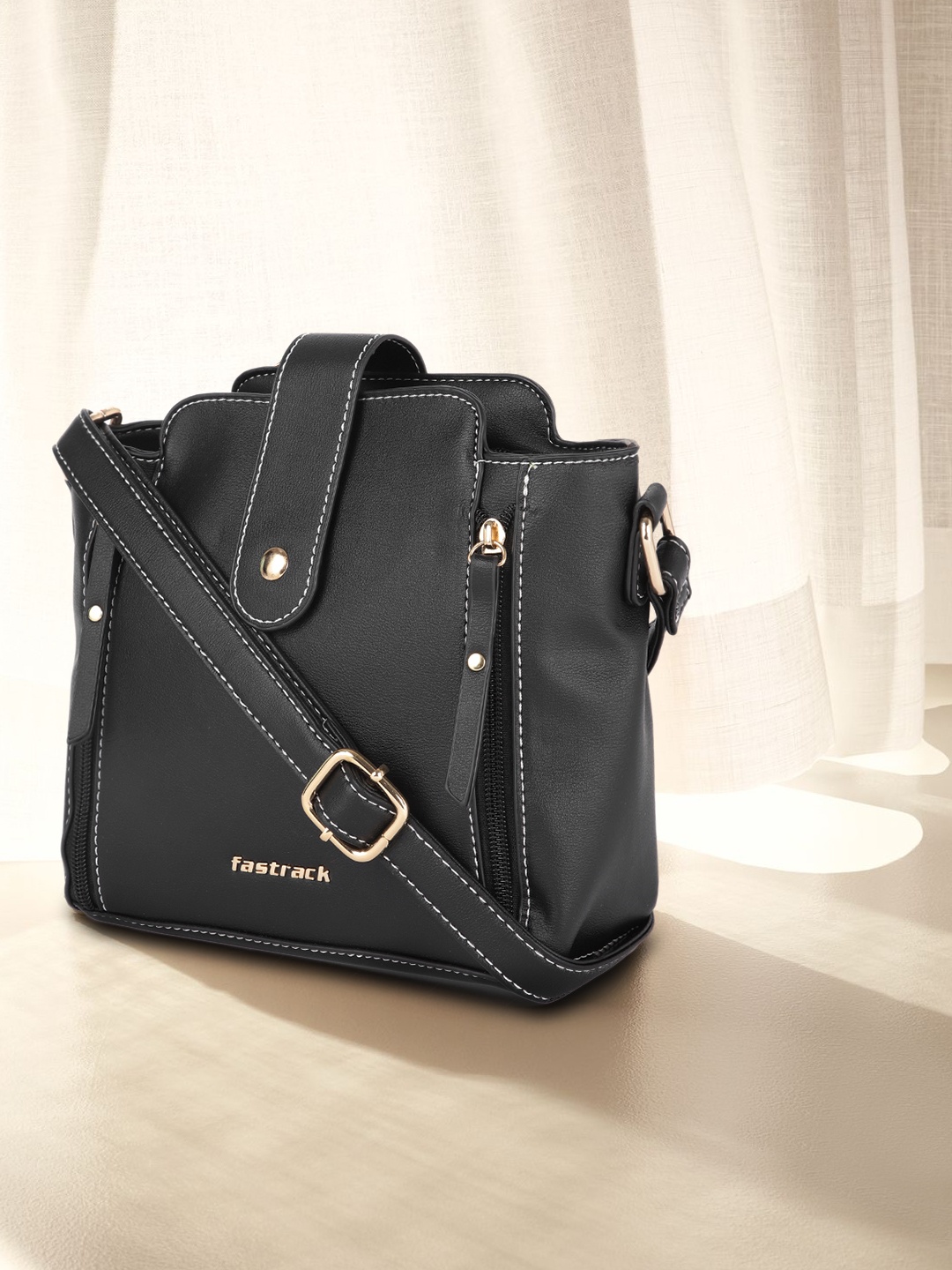 

Fastrack Black Solid Sling Bag