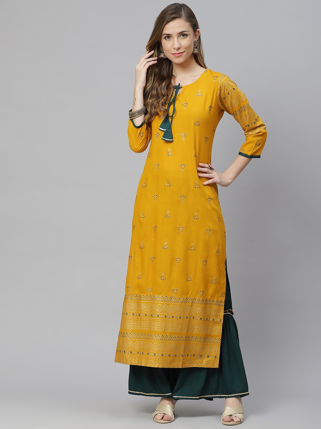 

Aasiya Women Yellow Floral Printed Regular Kurta with Sharara