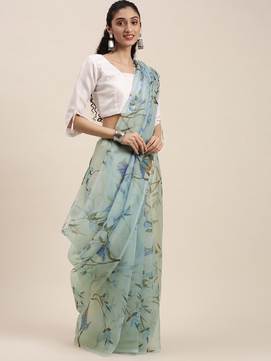 

Mitera Sea Green Ethnic Motifs Organza Saree