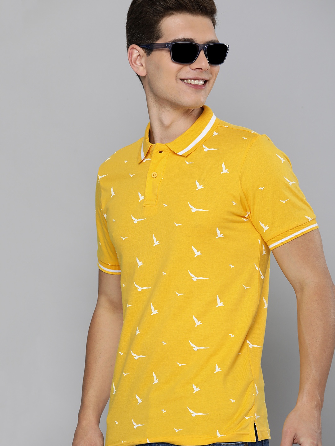 

HERE&NOW Men Yellow Cotton Printed Polo Collar T-shirt