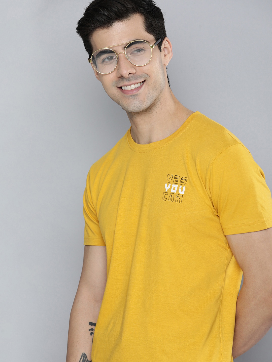 

HERE&NOW Men Mustard Yellow Solid T-shirt with Printed Detail