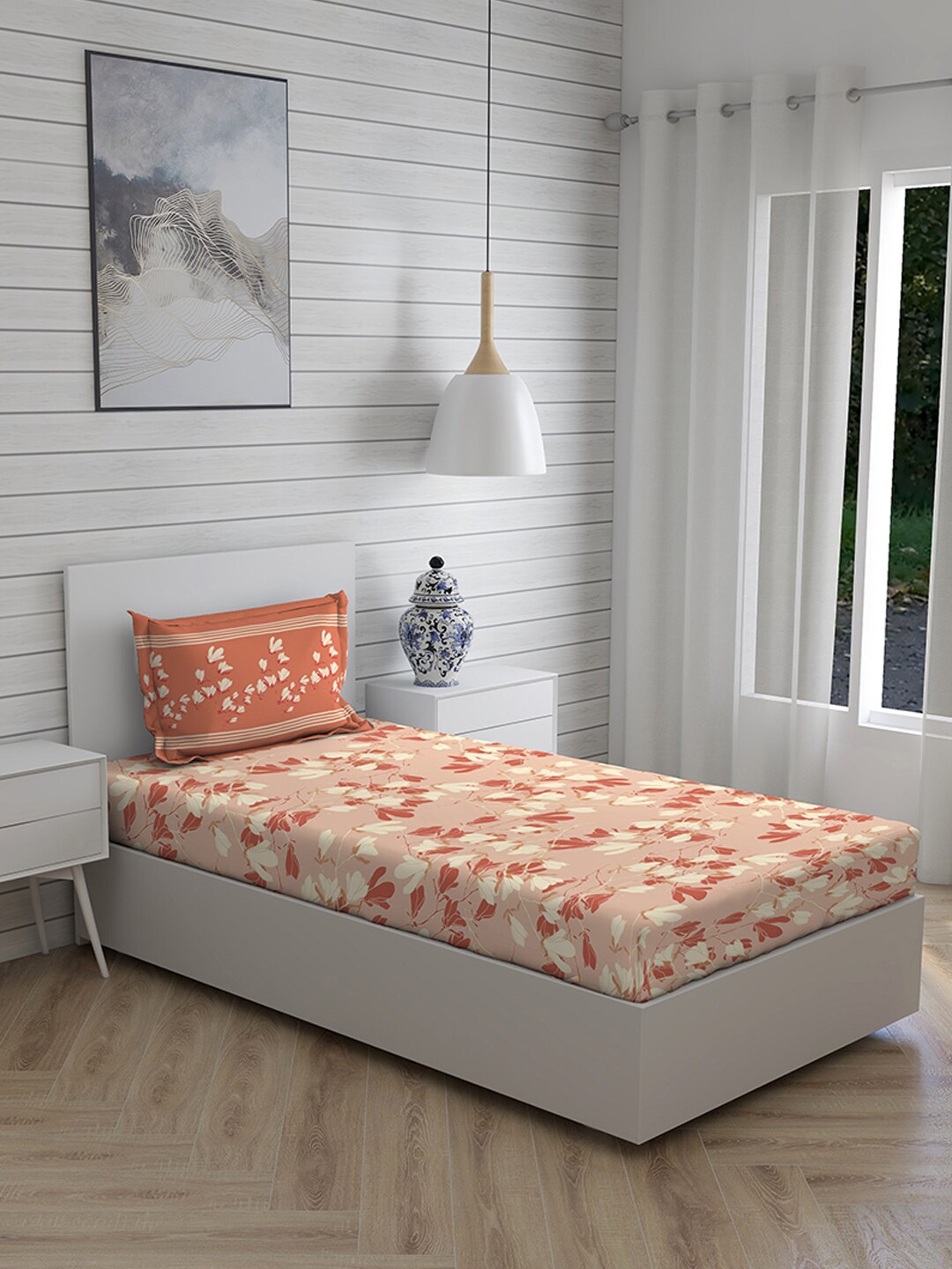 

Layers Orange & Beige Floral 104 TC Single Bedsheet with 1 Pillow Covers