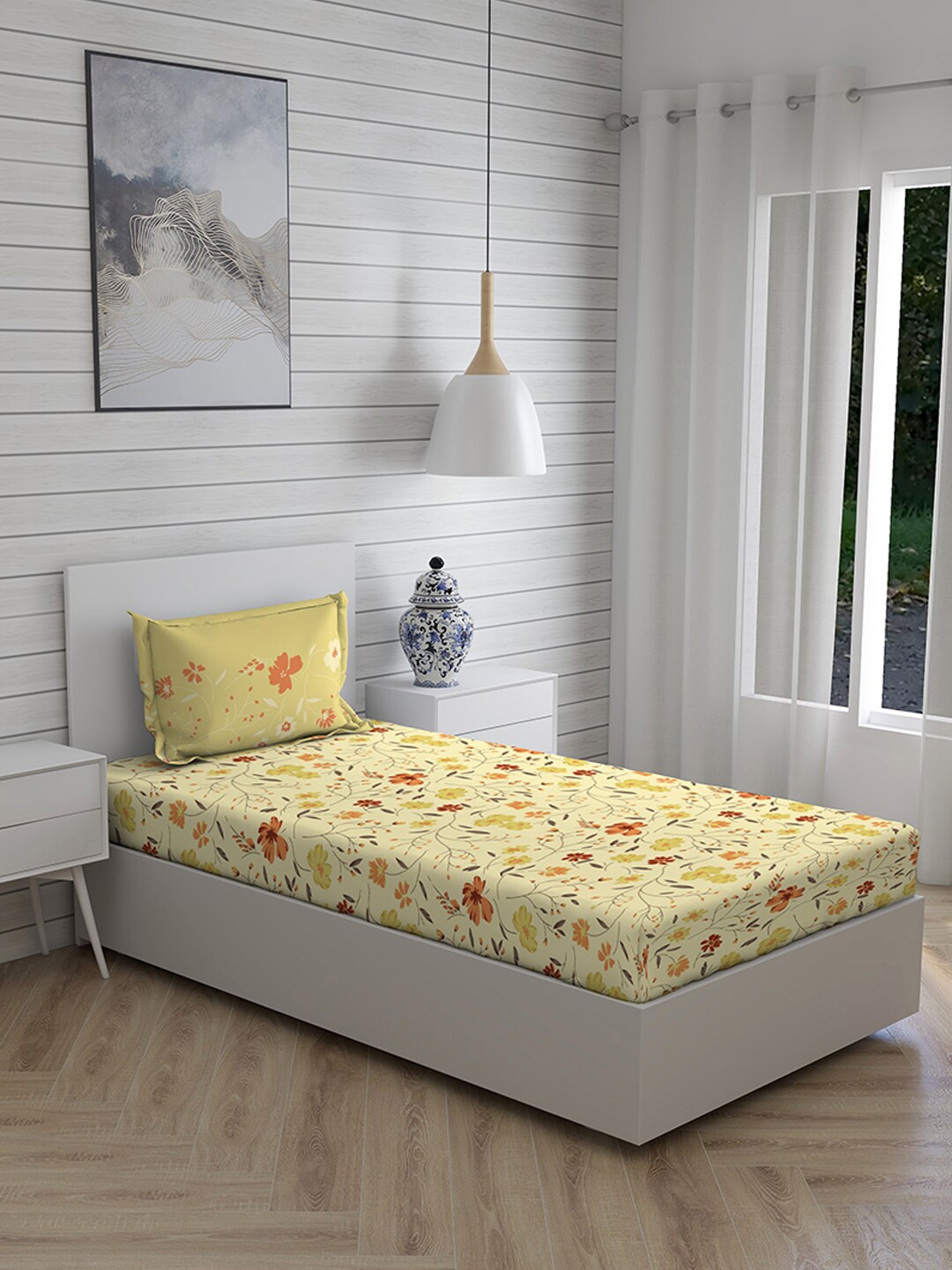 

Layers Yellow & Orange Floral 104 TC Single Bedsheet with 1 Pillow Covers