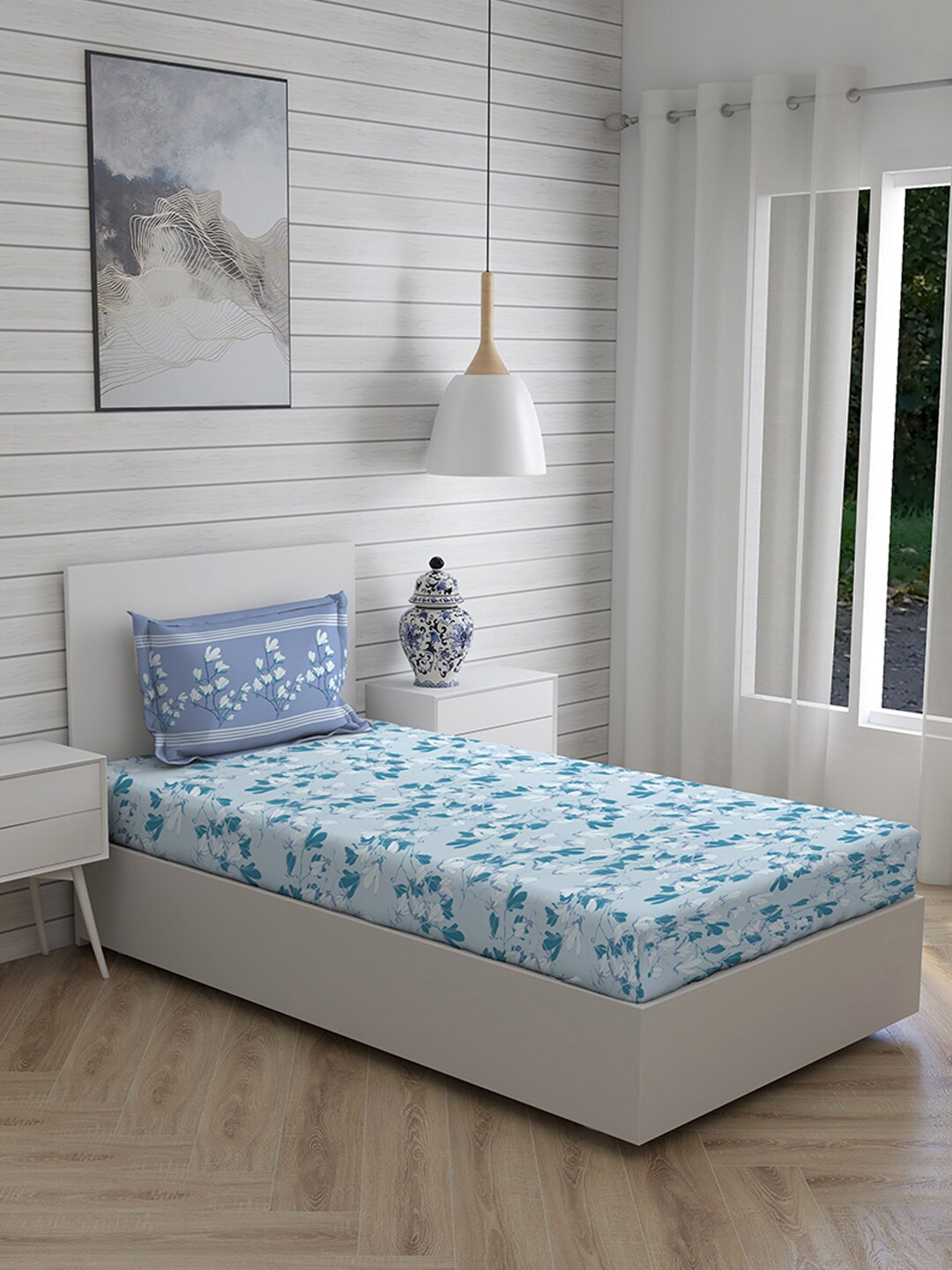 

Layers Blue & White Floral 104 TC Single Bedsheet with 1 Pillow Covers